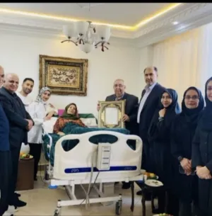 عیادت رئیس دانشگاه از سرکار خانم خسروی، به مناسبت روز ملی ماما