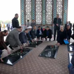 غبارروبی مزار شهدای گمنام در دانشگاه همزمان با دهه کرامت 